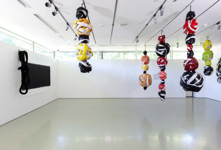 ‘Drawing’, ‘Sewn Sculpture’, ‘Balls (Hanging)’ Gallery II 2019 Charcoal, Paper, fabric, thread metal bracket, paper, paint metal rods, wood Photo: Dewi Tennat Lloyd