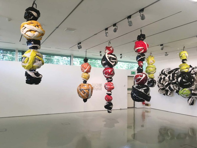 ‘Balls (Hanging)’,‘Wall drawing’ Gallery II 2019 Newsprint, paint, metal rods, dimensions variable Photo: Dewi Tennat Lloyd