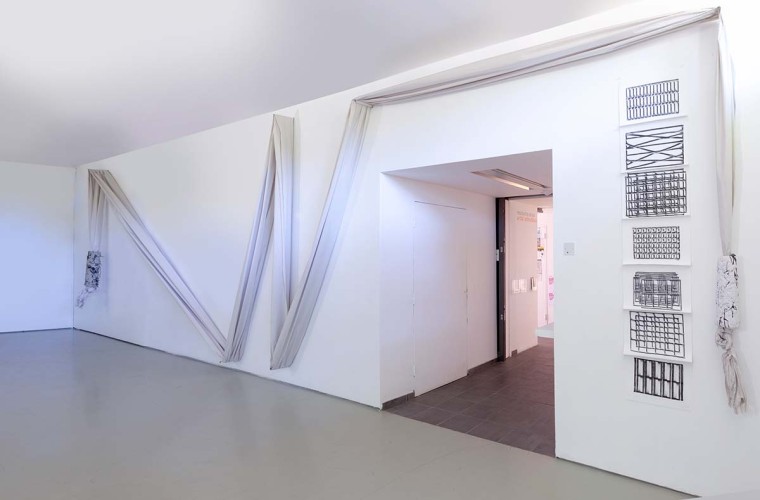 ‘Wall Drawing with Weights’ 2018-2019 Newsprint, paper-mache, dimensions variable ‘Seven Drawings’ 2016-2019 Fabriano paper, charcoal, thread H210cm x W48cm x D5cm Photo: Dewi Tennat Lloyd