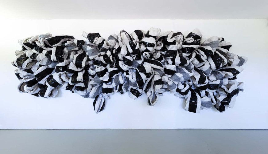 ‘Wall drawing’ 2019 Newsprint, paint, sewn linen bands dimensions variable Photo: Dewi Tennat Lloyd