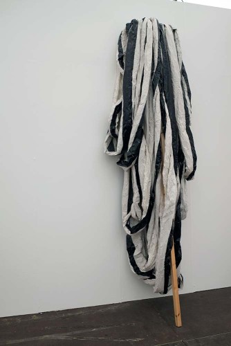 ‘Circular Black Lines’ 2016 Newsprint, paint, wood H300cm x W120cm x D50cm